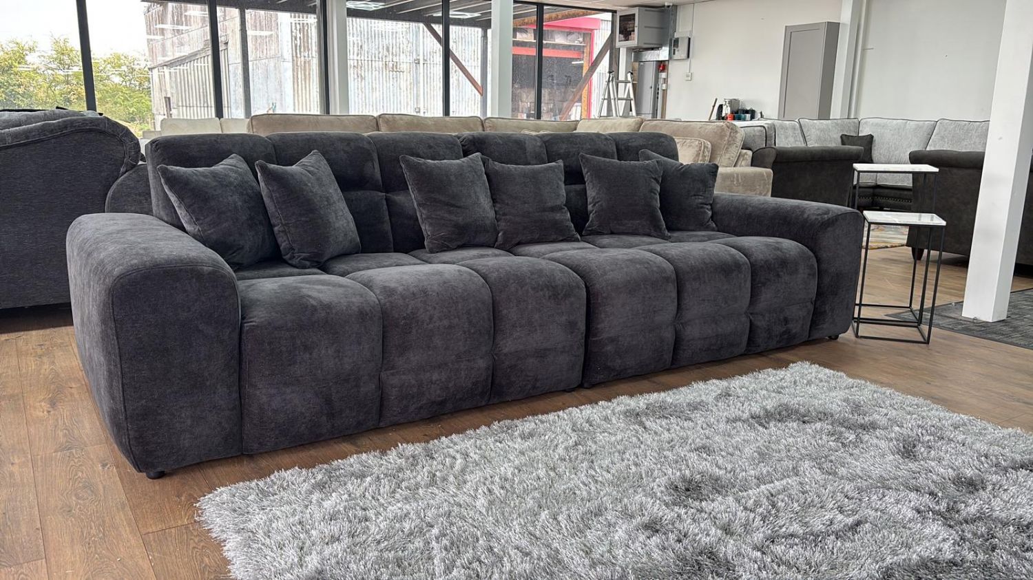 Black Textured Fabric Large 4 Seater Sofa - Image 3