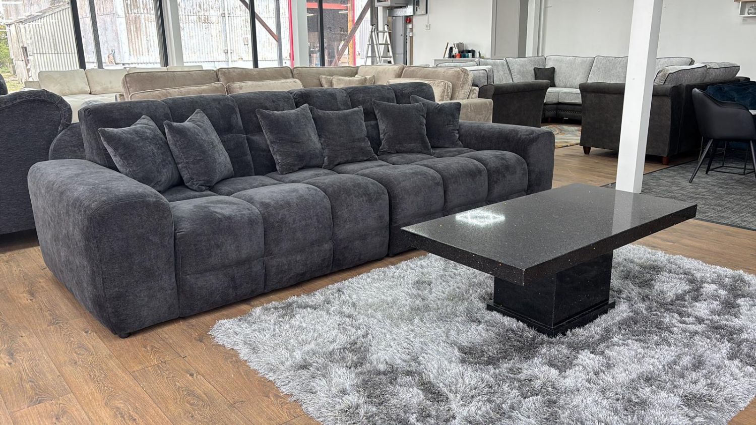 Black Textured Fabric Large 4 Seater Sofa - Image 5